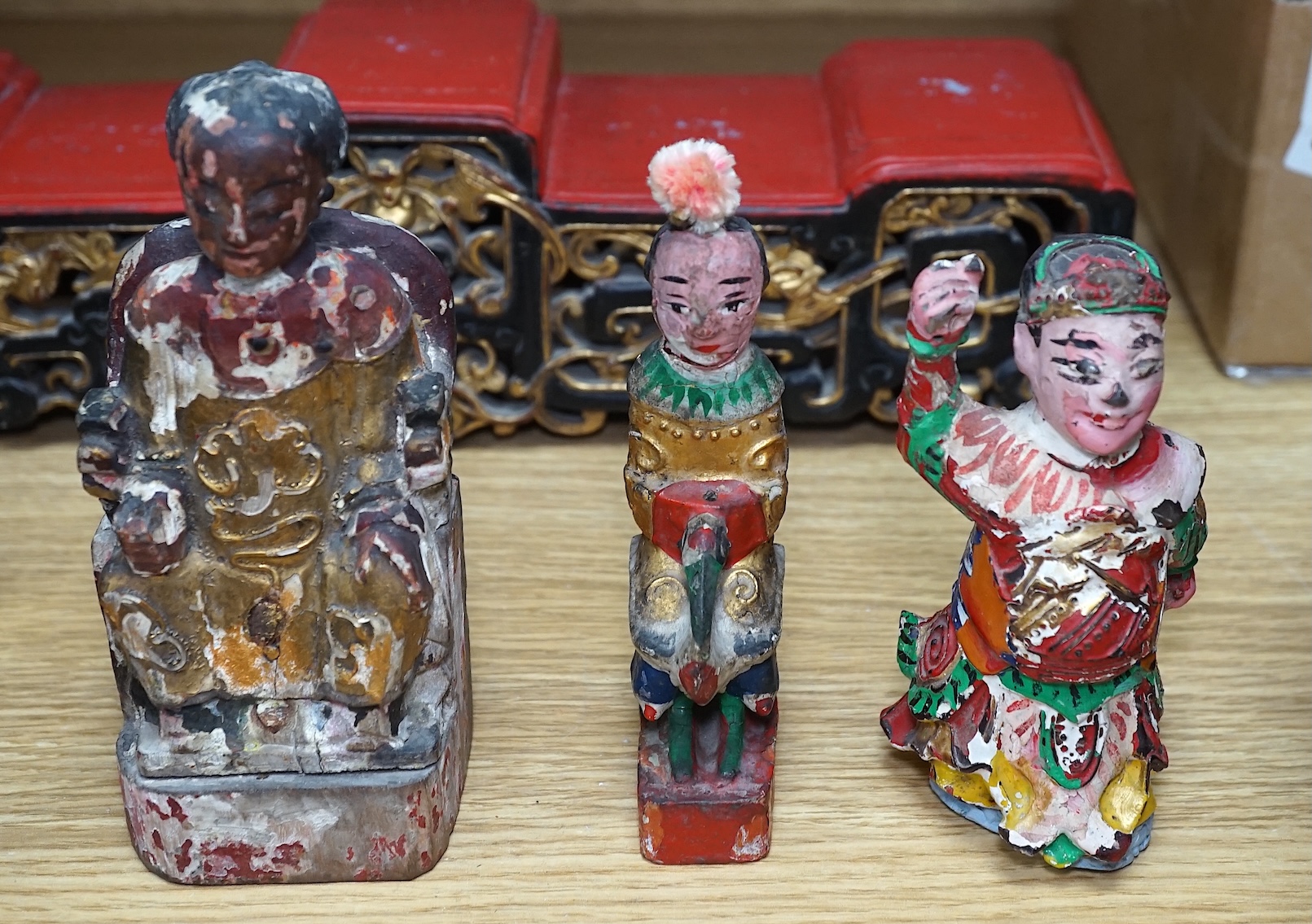 A carved painted South East Asian figure on stand, lacquered wood figures and carvings and a carved frog box, painted figure 50cm high. Condition - mixed, poor to fair